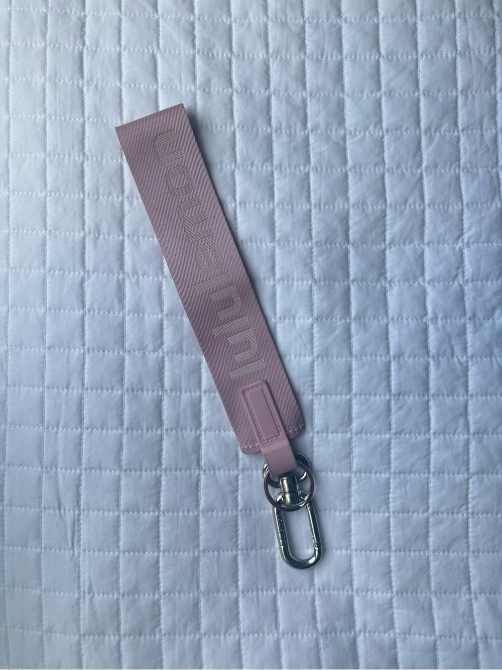 Lululemon blush pink never lost keychain